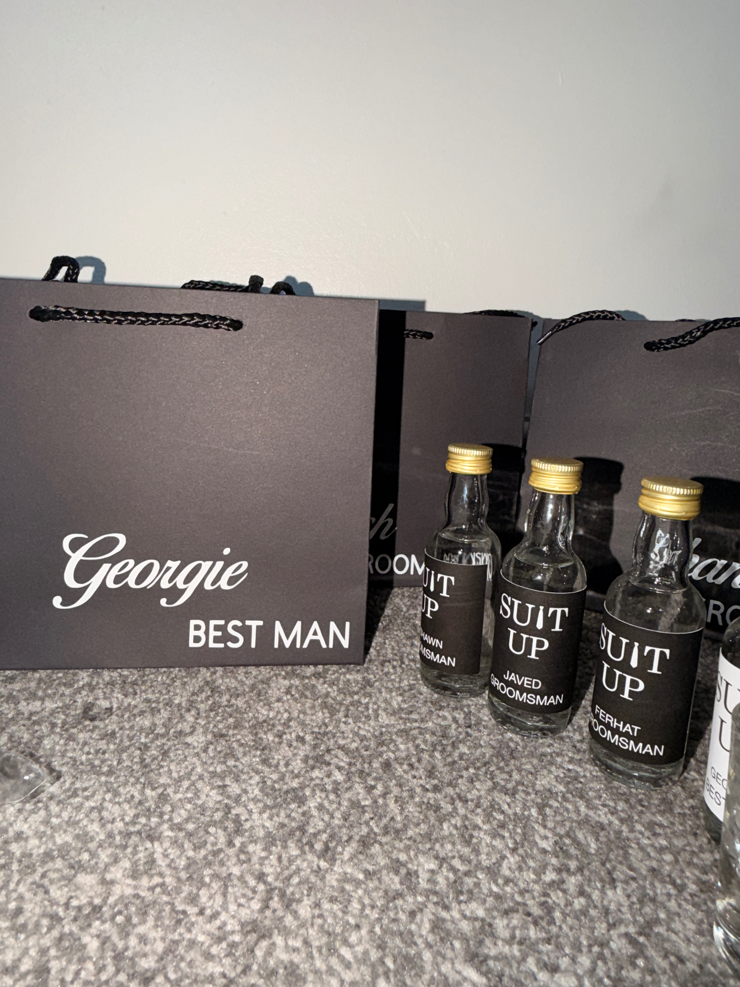 'Georgie Best Man' personalised gift bag paired with Suit Up bottles